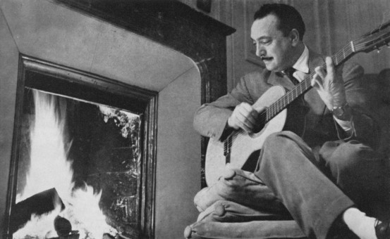 295-Django-playing-his-classical-guitar-1-553x340